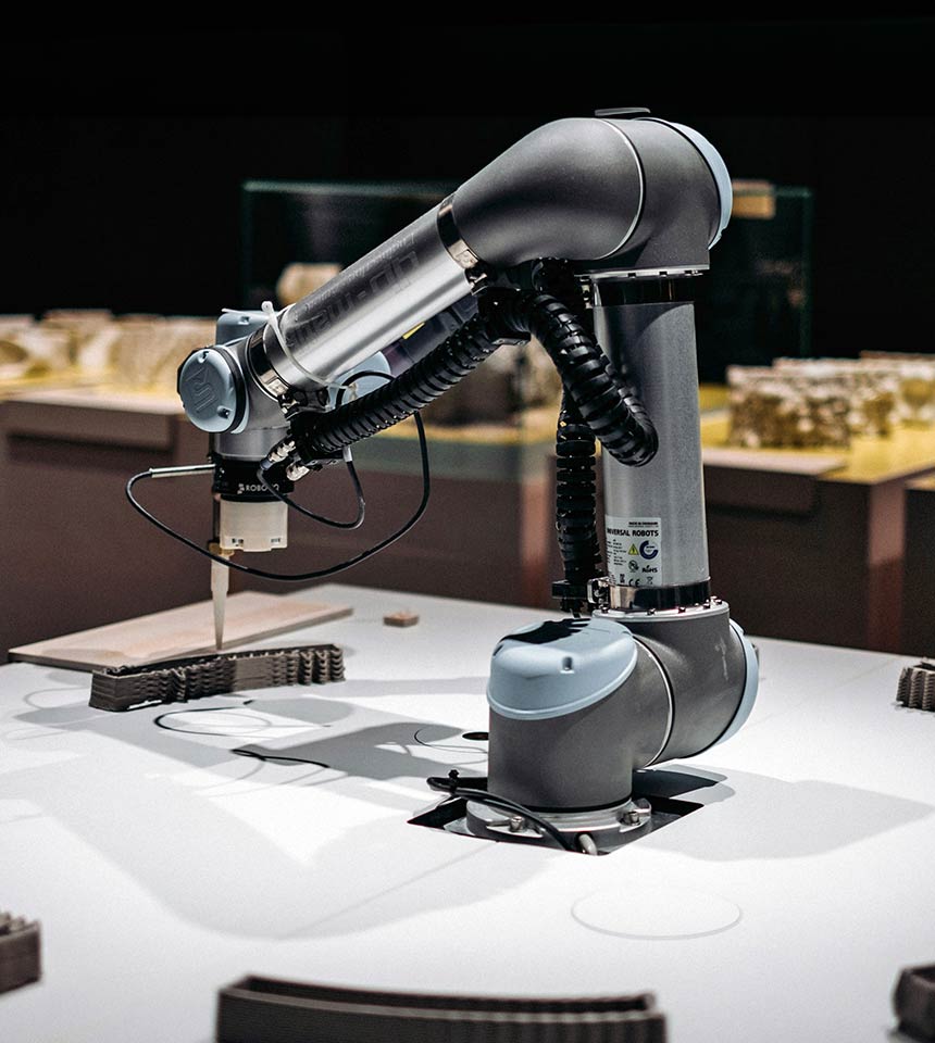 Man Using Measuring Tape in Factory Setting Man Using Measuring Tape in Factory Setting